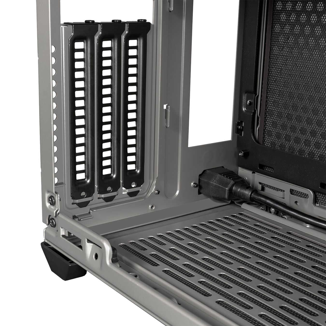 Close up view of the black vertical PCI brackets from the inside of the case. 